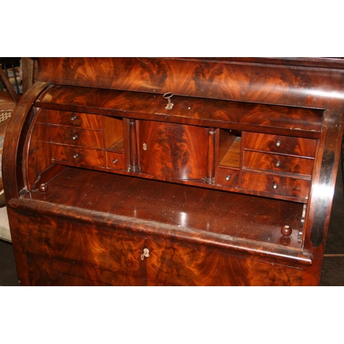 256 - Antique Continental flame mahogany veneered cylinder bureau with fully fitted interior including dra... 