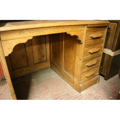 264 - Oak roll top desk with kneehole and pedestal of drawers, the tambour front opening to reveal fitted ... 