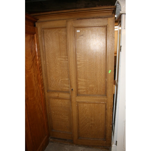 271 - Antique scumbled wooden two door wardrobe, raised on plinth base, 215cm high x 134cm wide x 54cm dee... 