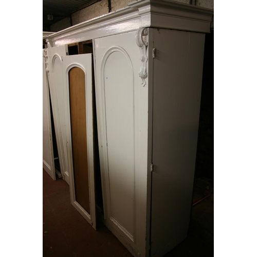 275 - Victorian cream painted triple door wardrobe with one third drawered interior and two thirds hanging... 