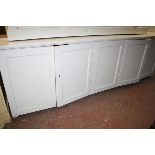 276 - Antique cream painted five door cupboard top with moulded cornice, on base, 284cm long x 253cm high.