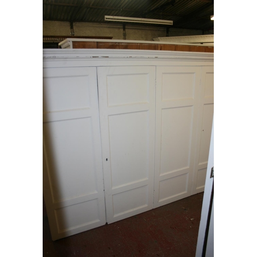 276 - Antique cream painted five door cupboard top with moulded cornice, on base, 284cm long x 253cm high.