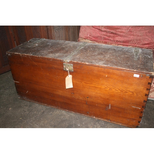 283 - Large pitch pine metal bound hinge top chest, 138cm long.