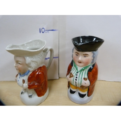 11 - Group of small ceramics to include Staffordshire figures, pastille burner, toby jug etc.