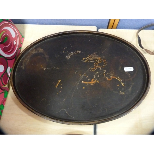 20 - Two Oriental lacquered trays to include a Chinese example.