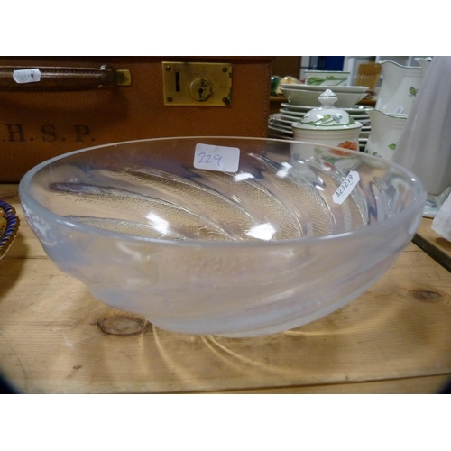 229 - Lalique-style opalescent glass bowl decorated with fish, 7.5cm high and 20cm diameter.