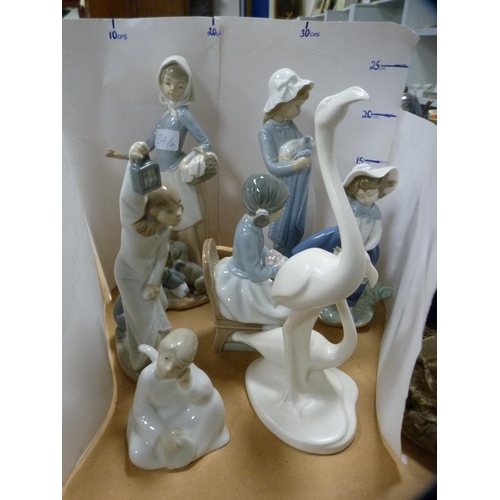 234 - Group of four Nao figures, an angel figure, swan group and a Lladro figure of a girl holding a baske... 