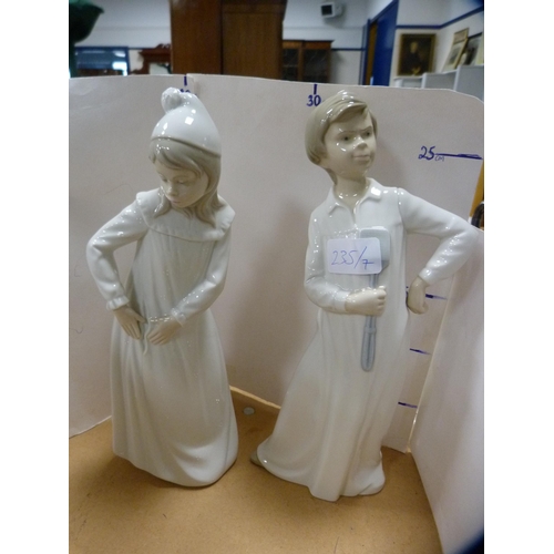 235 - Seven assorted Nao figures to include a pair wearing nightgowns.  (7)