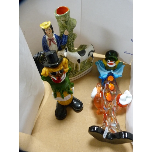 239 - Staffordshire posy vase modelled as a maiden and cow, and two Murano glass clown figures.  (3)