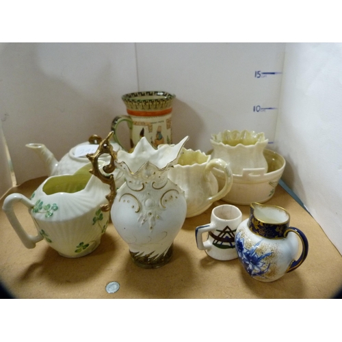 241 - Belleek teapot and a similar cream jug, early black backstamp for Fermanagh to the underside, simila... 