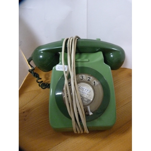 243 - Retro telephones in red, cream and green.  (3)