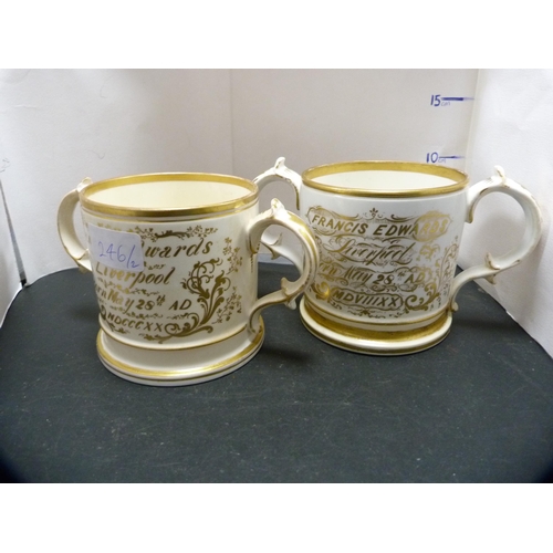 246 - Two Coalport-style ceramic loving cups with a gilt inscription, 'Francis Edwards, Liverpool'.