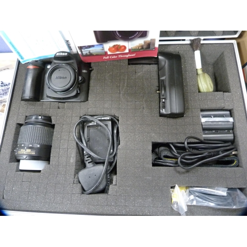 28 - Nikon D50 digital camera with accessories in fitted case.