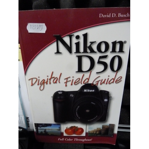 28 - Nikon D50 digital camera with accessories in fitted case.