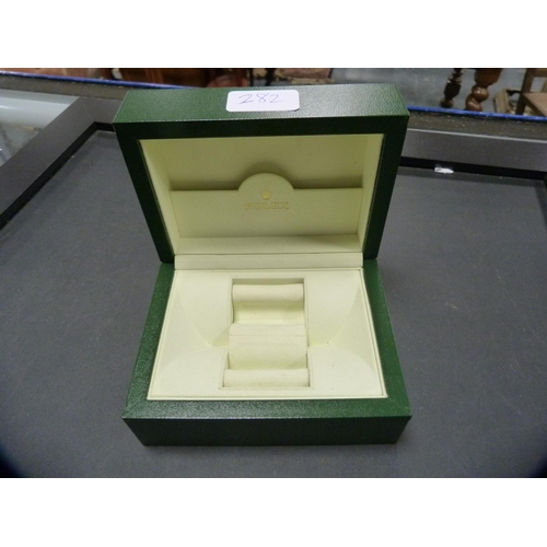 282 - Rolex green tooled watch box with gilt crown emblem to the top of the box, marked Rolex to the fitte... 