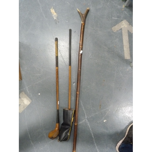 66 - Walking stick with antler handle and two hickory-shafted golf clubs.  (3)