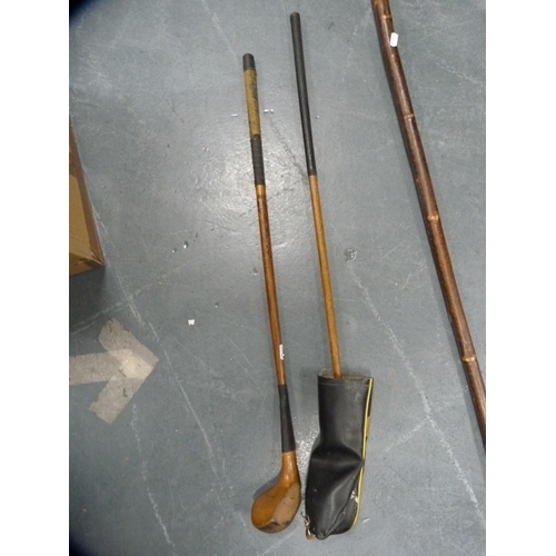 66 - Walking stick with antler handle and two hickory-shafted golf clubs.  (3)