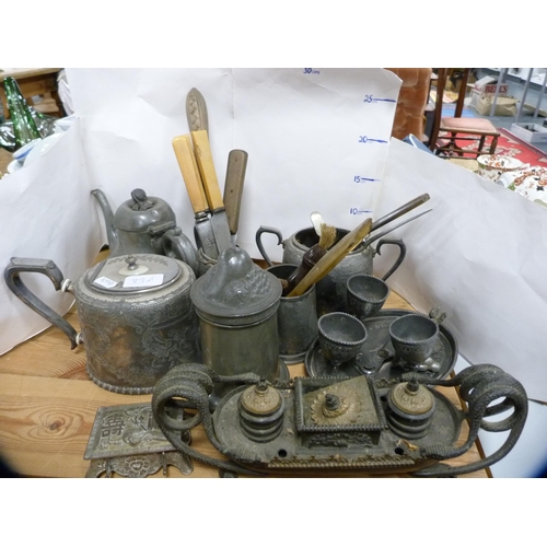 83 - Pewter and plated ware to include egg cruet, part tea sets, flatware etc.