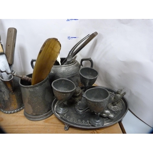 83 - Pewter and plated ware to include egg cruet, part tea sets, flatware etc.