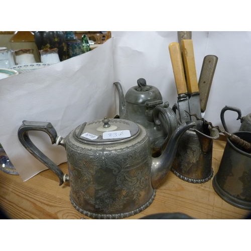 83 - Pewter and plated ware to include egg cruet, part tea sets, flatware etc.