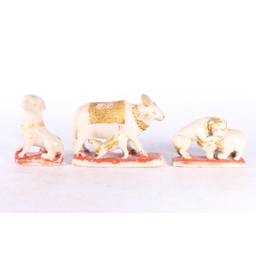 132 - Indian painted soapstone figure 16cm tall and three matching animal models. (4)