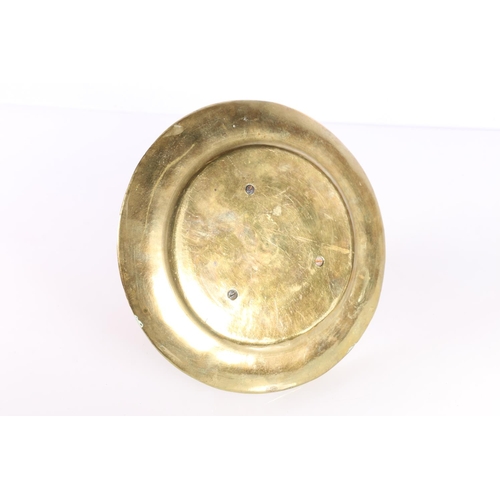 155 - Indian brass inkwell raised on ram mask and dolphin supports, 19cm diameter.