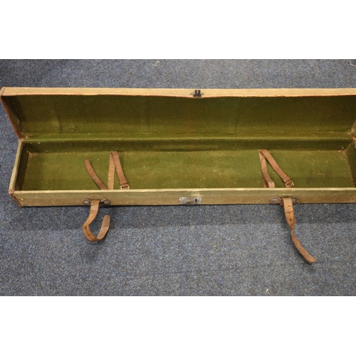 368 - Large canvas and leather bound gun case.