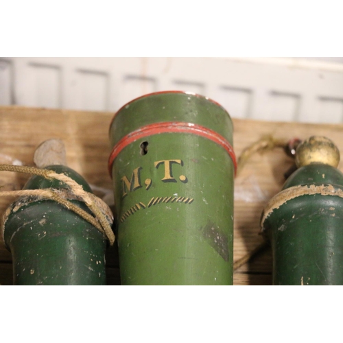 374 - Green painted metal sceptre case, 63cm long, and four green painted wooden batons, 55cm long.