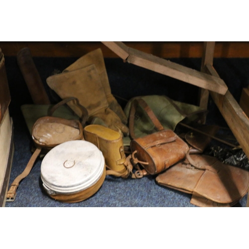 383 - Two leather binocular cases, a leather holster, a leather sword case, gauntlets, etc.