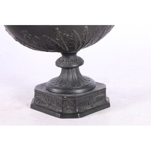 43 - Wedgwood black basalt oil lamp in the form of an Aladdin lamp with figure reading surmount, 23cm tal... 