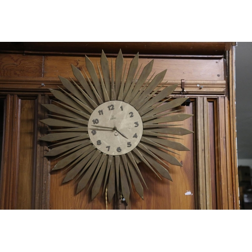 59A - Synchron sunburst electric wall clock, 58cm diameter.