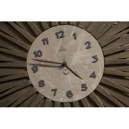 59A - Synchron sunburst electric wall clock, 58cm diameter.