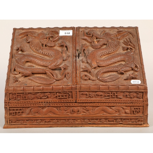 510 - Hardwood letter rack with dragon and Oriental designs in relief 