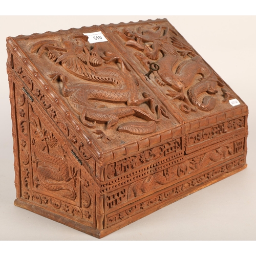 510 - Hardwood letter rack with dragon and Oriental designs in relief 