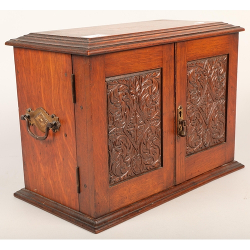 535 - Small smoking cabinet with pipes and other smoking-related ephemera