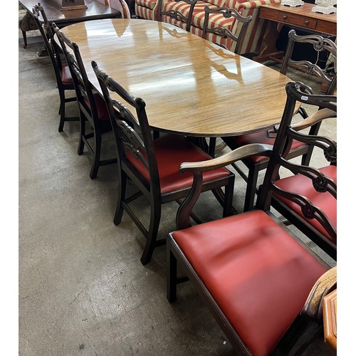 542 - Rengency style mahogany dining table with eight ladder back dining chairs