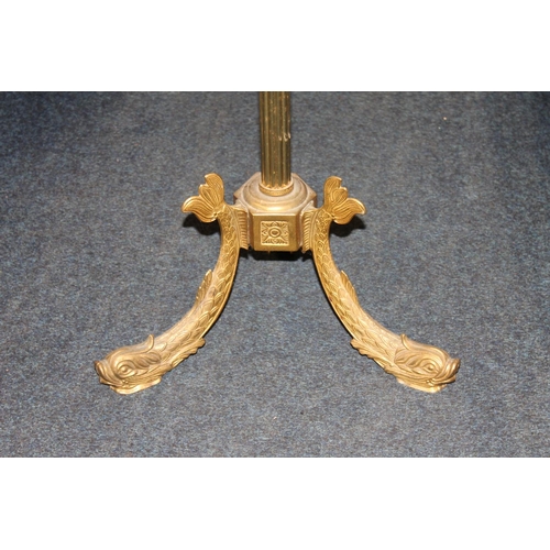 421 - 20th century brass and onyx coat stand raised on three dolphin supports, 175cm tall.