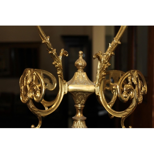 421 - 20th century brass and onyx coat stand raised on three dolphin supports, 175cm tall.