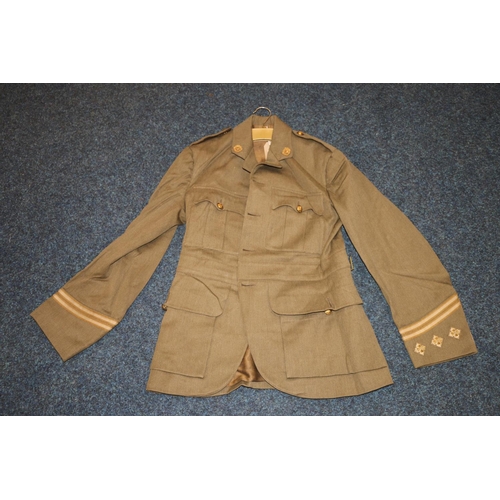 349E - British army green khaki jacket having Royal Scots brass buttons and collar buttons and lower sleeve... 