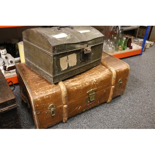 379 - Wood bound cabin trunk and a metal trunk.