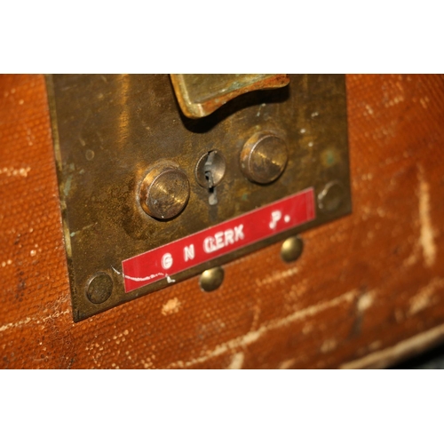 379 - Wood bound cabin trunk and a metal trunk.