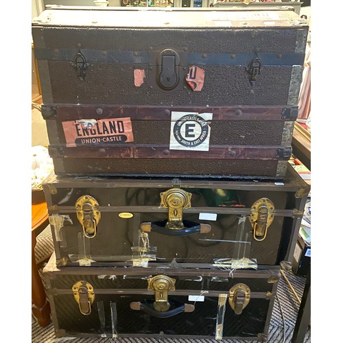 464 - Three large vintage luggage trunks