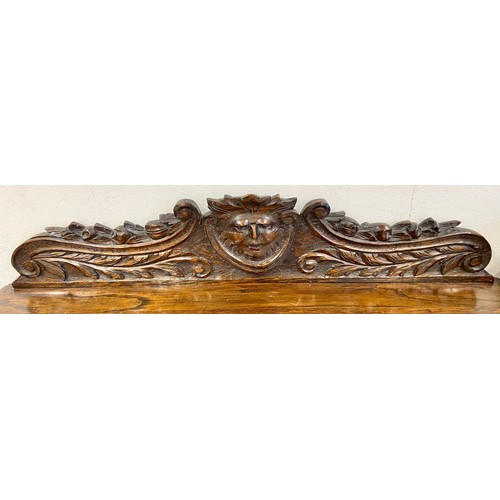 505 - Ornate oak hall table with floral and classical design in relief with fitted drawer