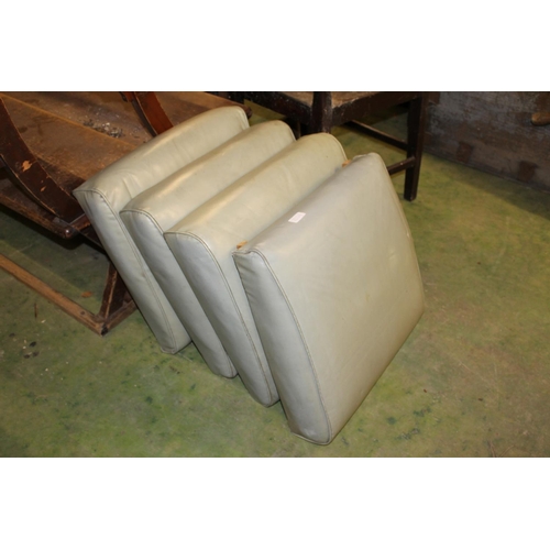 253D - Four leather covered classic Land Rover seat pads.