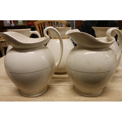 174B - Five Victorian porcelain wash jugs.