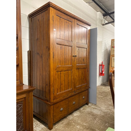 555 - Rustic style contemporary pine wardrobe over fitted drawer, 124 x 61 x 200cm