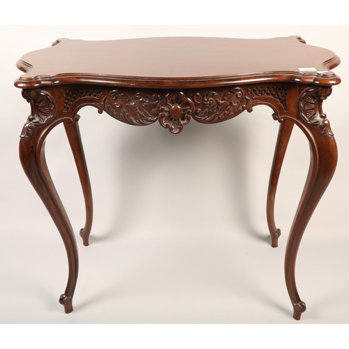 514 - Victorian mahogany hall table with ornate designs in relief