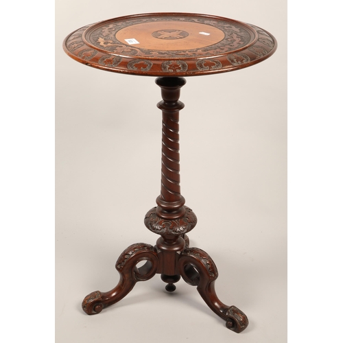 533 - Hardwood drum table with ornate designs in relief