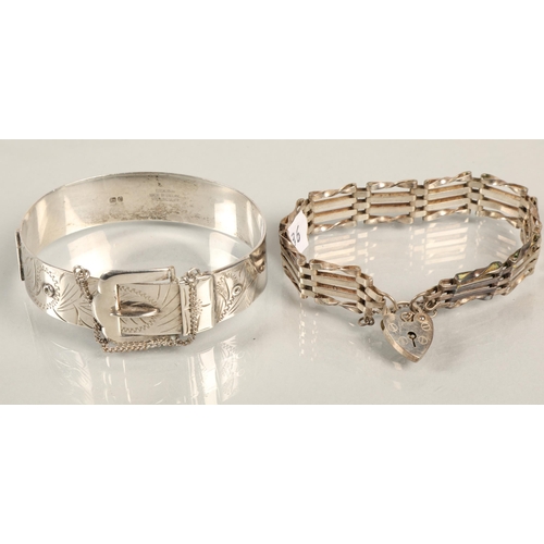 57 - Silver bracelet with buckle and silver bracelet with heart pendant, total weight: 43.2g