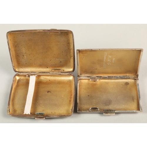 58 - Two silver cigarette cases, one with 'H.A.G.' initials; the other with 'E.C.G.' initials. Total weig... 